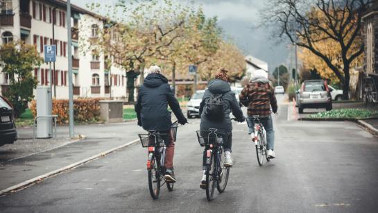 three bikers on the local street