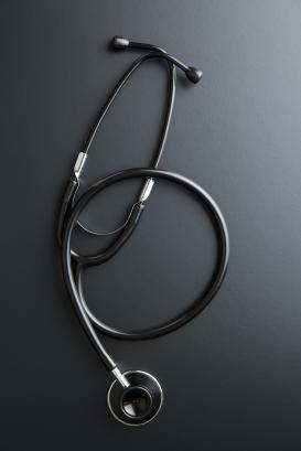 stethoscope on black table