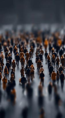 Tilt-shift crowd scene shows busy partially blurred pedestrians moving through moody city space. Downloaded Tilt-shift crowd scene shows busy partially blurred pedestrians moving through moody city space. 